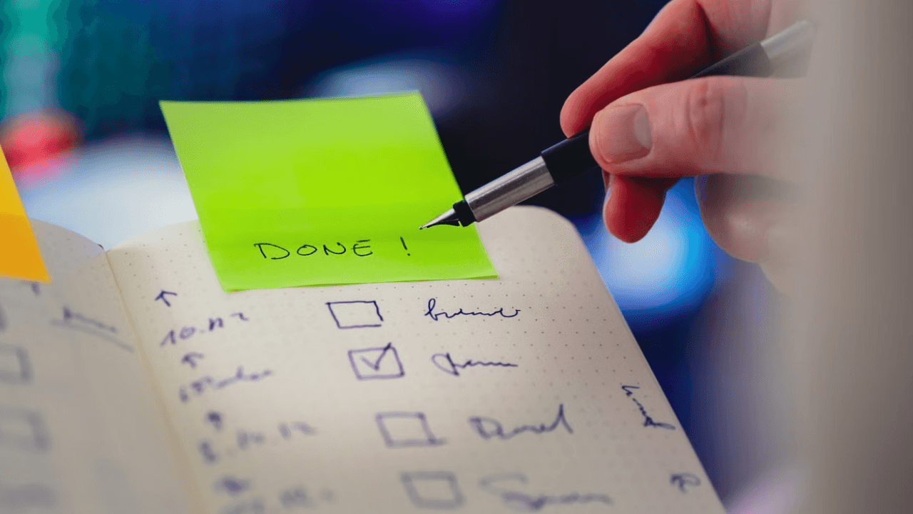 Checklist with a sticky note marked done